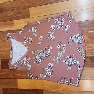 Women's tank top with floral pattern on it.